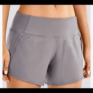 CRZ YOGA Women's Mid-Rise Quick-Dry Athletic Sports Running Workout Shorts